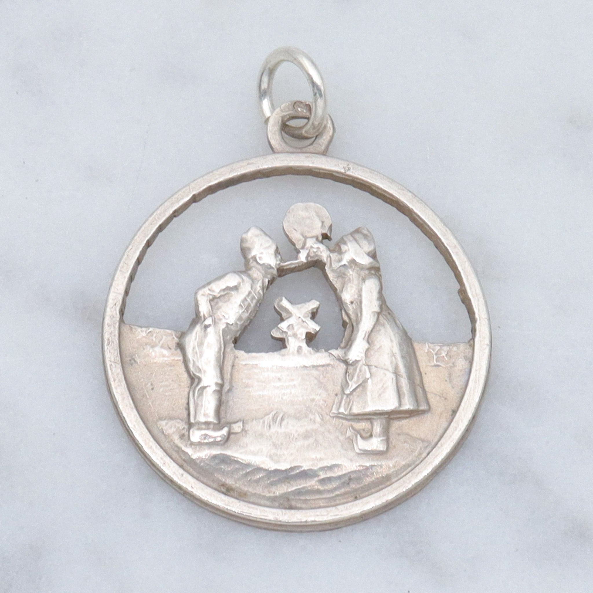 Vintage Dutch .800 silver cutout courting couple charm pendant
